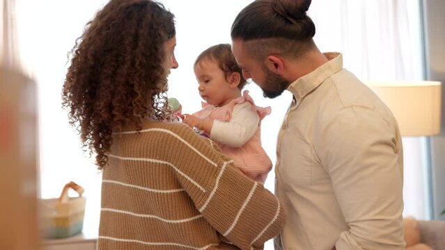 Mother and father kiss newborn baby with love, care and bonding together at home for family lifestyle, child healthcare and wellness. Healthy child with parents for growth, development or mothers day