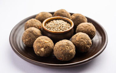 Bajra Atta Ladoo or kuler laddoo - Millet Flour Laddu, a popular winter sweet snack food from India