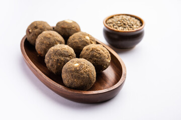 Bajra Atta Ladoo or kuler laddoo - Millet Flour Laddu, a popular winter sweet snack food from India