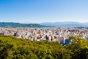 Fototapeta na wymiar Cityscape of Matsuyama city in Ehime prefecture, Shikoku, Japan.