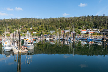 Fototapeta na wymiar Reflections in the habor in Queen Charlotte City on Hadai Gwaii island in British Columbia, Canada