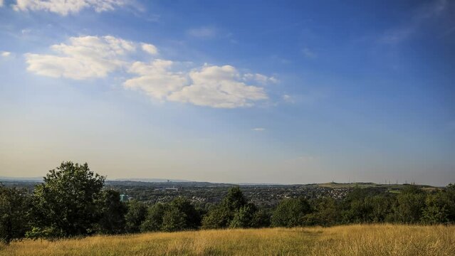 time-lapse shot  above tameside , short clip with very animated clouds 