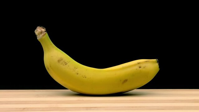 Banana is chopped. Stop motion animation.