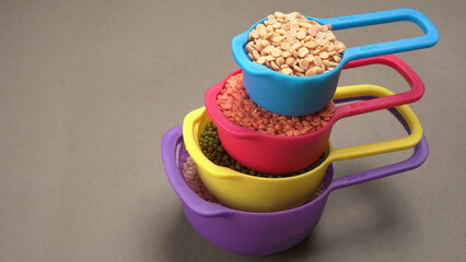 Assorted different types of beans and cereals grains. Set of indispensable sources of protein for a healthy lifestyle. Everyday use at Indian households.