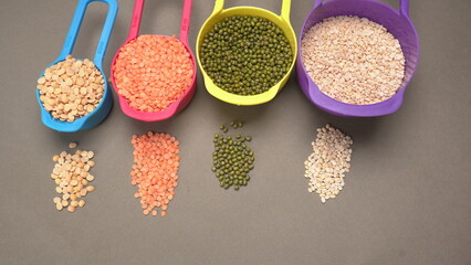 Assorted different types of beans and cereals grains. Set of indispensable sources of protein for a healthy lifestyle. Everyday use at Indian households.