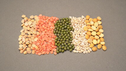 Assorted different types of beans and cereals grains. Set of indispensable sources of protein for a healthy lifestyle. Everyday use at Indian households.