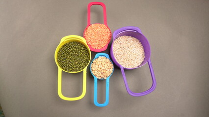 Assorted different types of beans and cereals grains. Set of indispensable sources of protein for a healthy lifestyle. Everyday use at Indian households.