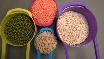 Assorted different types of beans and cereals grains. Set of indispensable sources of protein for a healthy lifestyle. Everyday use at Indian households.