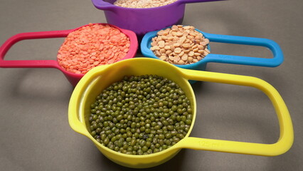 Assorted different types of beans and cereals grains. Set of indispensable sources of protein for a healthy lifestyle. Everyday use at Indian households.