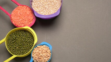 Assorted different types of beans and cereals grains. Set of indispensable sources of protein for a healthy lifestyle. Everyday use at Indian households.