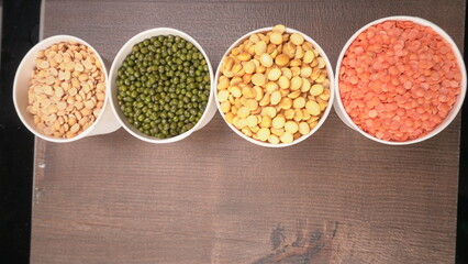 Assorted different types of beans and cereals grains. Set of indispensable sources of protein for a healthy lifestyle. Everyday use at Indian households.