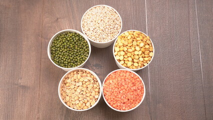 Assorted different types of beans and cereals grains. Set of indispensable sources of protein for a healthy lifestyle. Everyday use at Indian households.