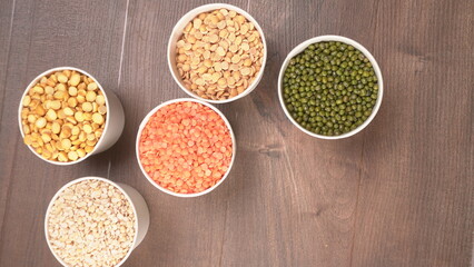 Assorted different types of beans and cereals grains. Set of indispensable sources of protein for a healthy lifestyle. Everyday use at Indian households.