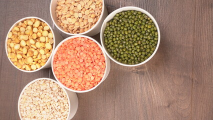 Assorted different types of beans and cereals grains. Set of indispensable sources of protein for a healthy lifestyle. Everyday use at Indian households.