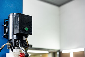 The electric lift for cars in the car repair service