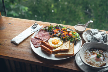 Breakfast on the wooden table at the cafe