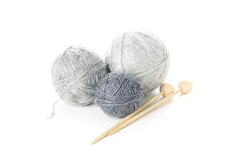 Yarn and knitting needles isolated on white background