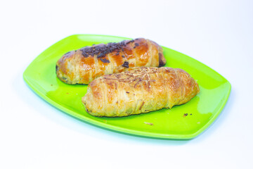 Bolen Pisang or Bolen Bandung is Banana Wrapped with Puff Pastry. It is usually as souvenirs from Bandung, West Java. Selective focus.