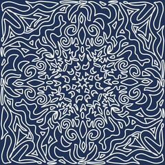Fototapeta premium Decorative ornament on a blue background. Snowflake.