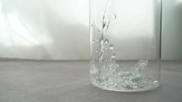 Cleaning orthodontic clear aligners for teeth. slow motion video.