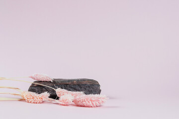 Podium for goods and cosmetics made of natural materials.