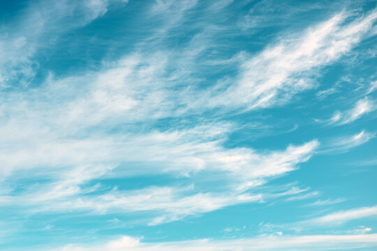 Beautiful turquoise sky with white clouds, nature background.