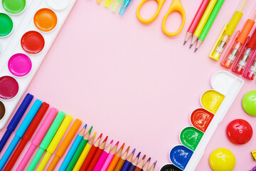 Preparation and study of elementary school children. Bright and colorful school experience with stationery accessories for learning common subjects. Flat, copy space, space for text.