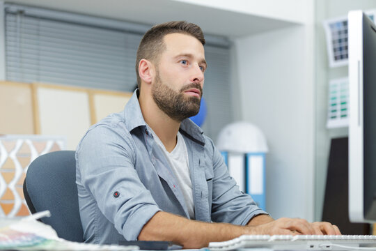 a man is checking stock