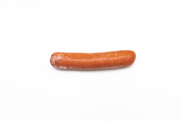 frozen sausage with traces of frost on a white background