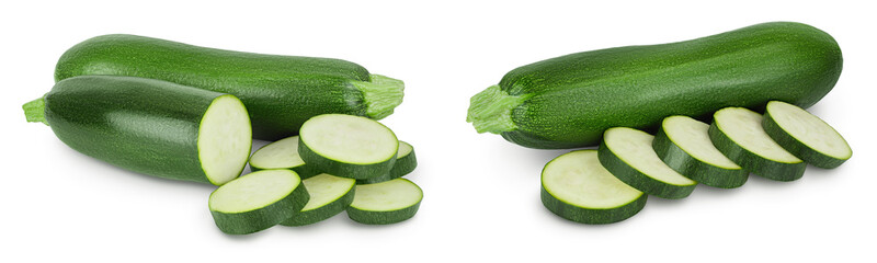 Fresh whole and sliced zucchini isolated on white background with full depth of field