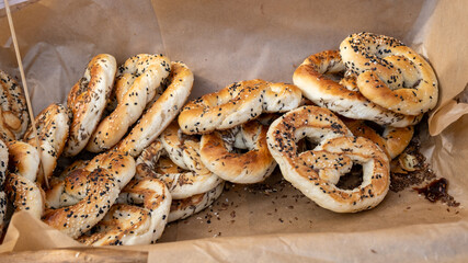 fresh freshly baked pretzels with seeds. handmade Latvian craftsman's market