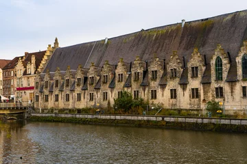 Deurstickers Groot Vleeshuis , former covered market and guildhall in Ghent old town during winter cloudy : Ghent , Belgium : November 30 , 2019 © fukez84