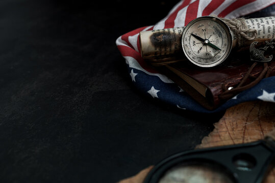 Columbus Day background. Map and discovery of old equipment. Exploration and history of America in October.
