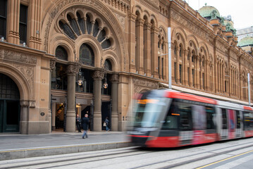 Light rail and old sandstone building in Sydney