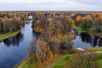 State museum Pavlovsk in autumn. Pond in Pavlovsky Park. Aerial view.
