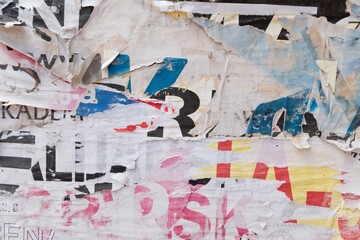 Fototapeta premium Torn street poster background with text, abstract paper collage