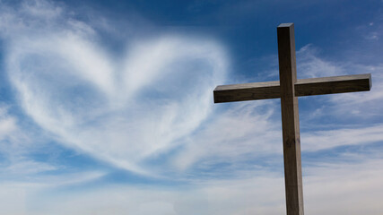 Jesus Christ cross. Easter, resurrection concept. Christian wooden cross on a background with dramatic lighting, colorful mountain sunset, dark clouds and sky, sunbeams.