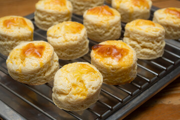 Homemade  Scones on the cooling tracke. Scones is English pastry for afternoon tea