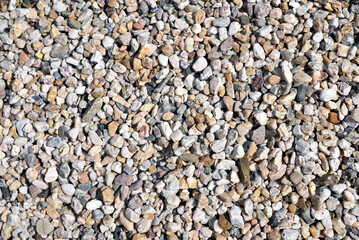 quarrying of gravel and sand in a gravel pit - background pebbles