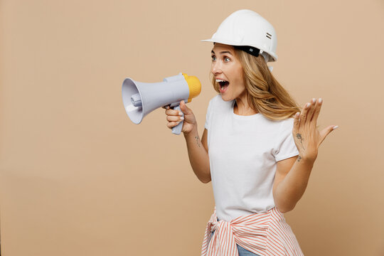 Young Employee Laborer Handyman Woman In White T-shirt Helmet Hold Scream In Megaphone Discount Sale Isolated On Plain Beige Background Instruments Accessories For Renovation Room Repair Home Concept