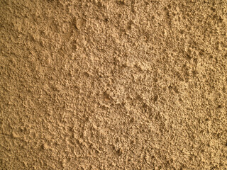 Brown color rough cement wall background texture.