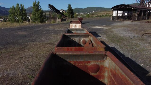 Travelling from the top of some old wagons used to transport coal in the mine