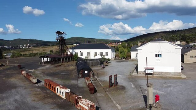Ancient mine tower and buildings  of an underground coal mine called Pozo Julia in Fabero (Spain) Aerial view
