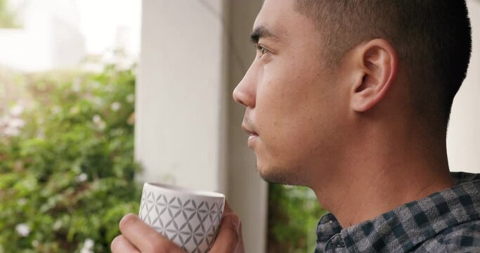 Thinking man drinking coffee in peace outdoor for break, rest and relaxing morning. Asian person face, mindset ideas and remember thoughtful inspiration sipping on warm, fresh and hot tea beverage