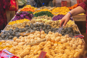 Taiwanese traditional sweet sesame balls on display at Chinese New Year market on Dihua street in Taipei, Taiwan