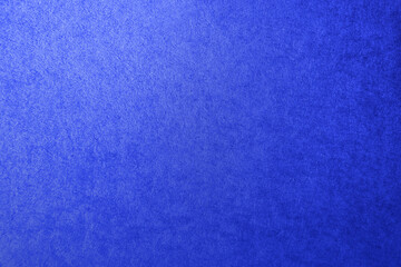 Solid navy blue tone color gradation paint on corrugated cardboard box paper texture background...