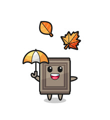 cartoon of the cute carpet holding an umbrella in autumn