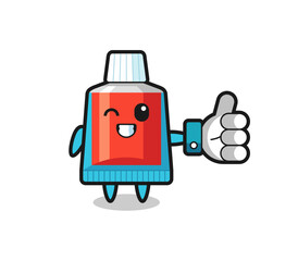 cute toothpaste with social media thumbs up symbol