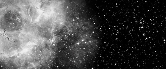 black and white picture of a glalaxy on a black background