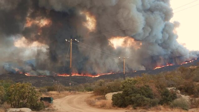 Fairview Fire Raging Amidst Tropical Storm Kay Near Hemet In Southern California. wide
